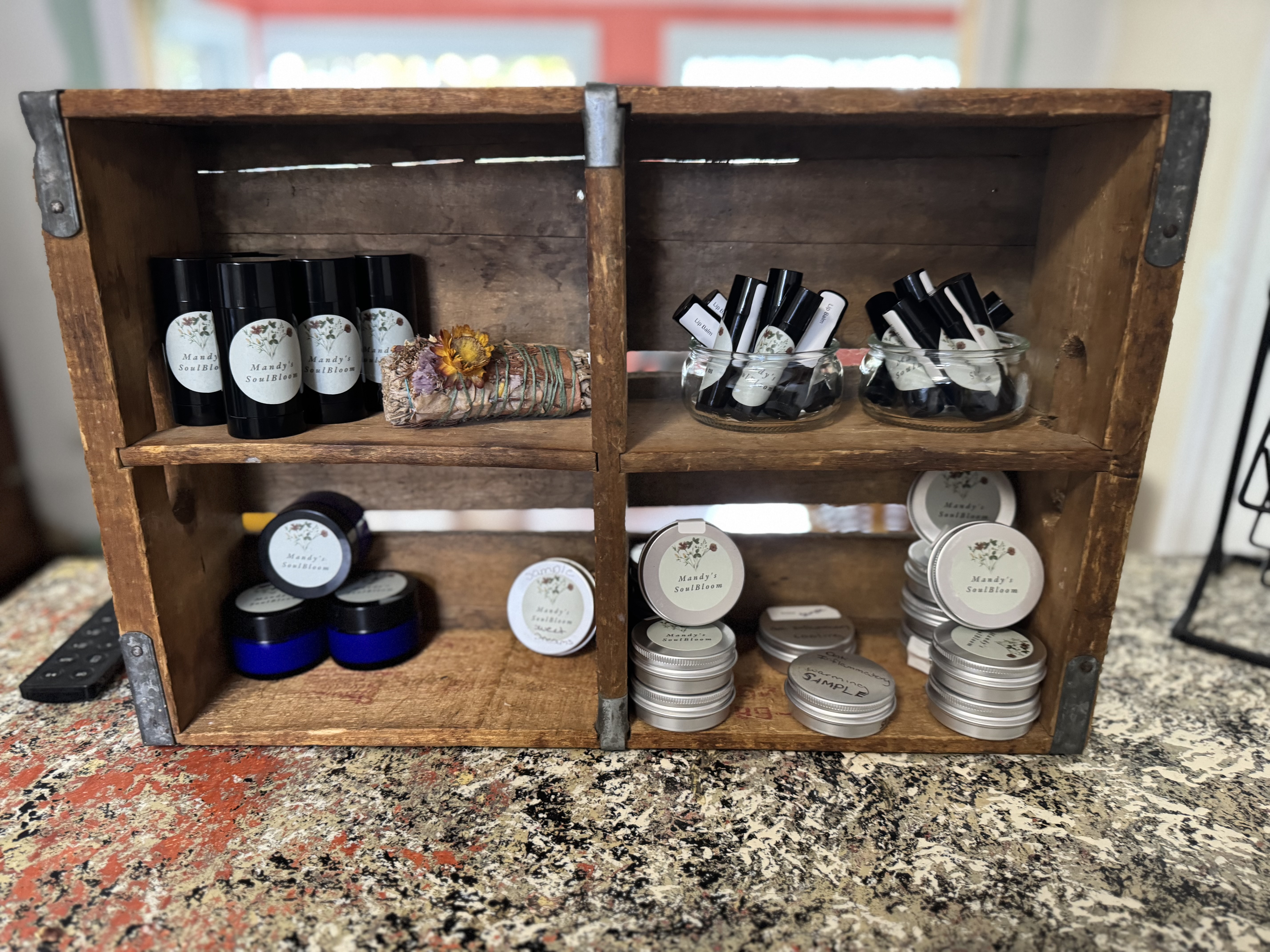 Sol Bloom products displayed in wooden crate